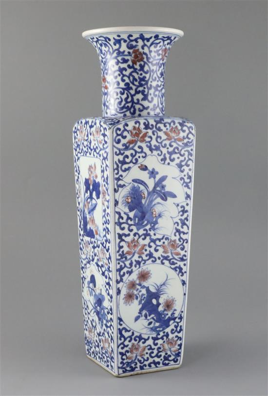 A Chinese underglaze blue and copper red square baluster vase, late Qing dynasty, H. 43.5cm